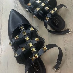 Black and gold studded flats with pointed toe and ankled buckle